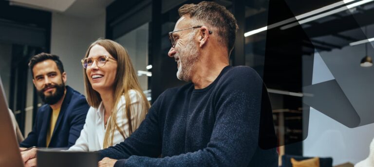 Team collaborating in a modern office setting, representing public sector transformation powered by Microsoft Azure.